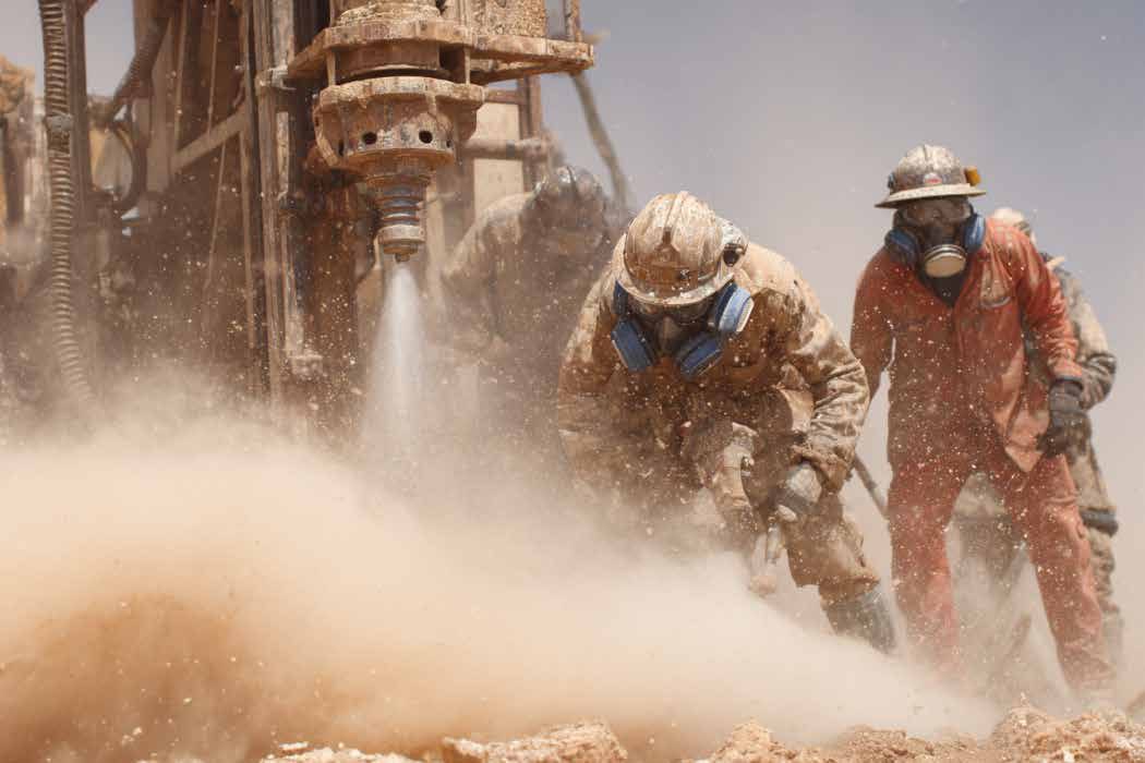 Drilling rig against the arid landscape